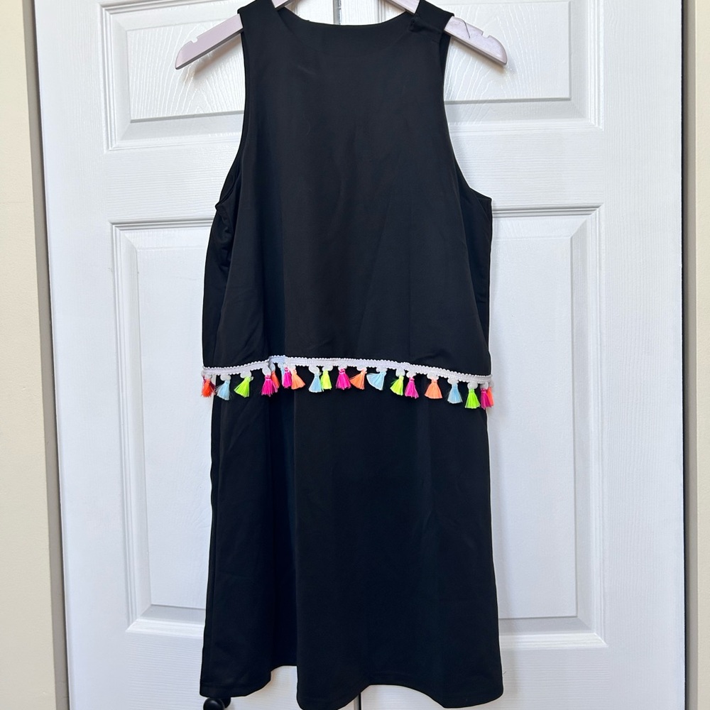 Black Shift Dress with Colorful Tassel accents and one snap shoulder.  Sz: XL